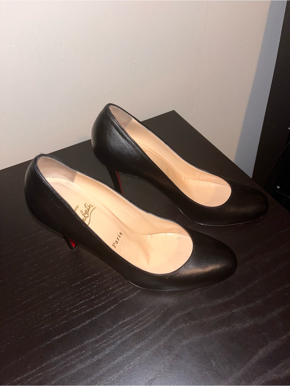 Christian Louboutin Black Leather Round-Toe Pump with Red Sole